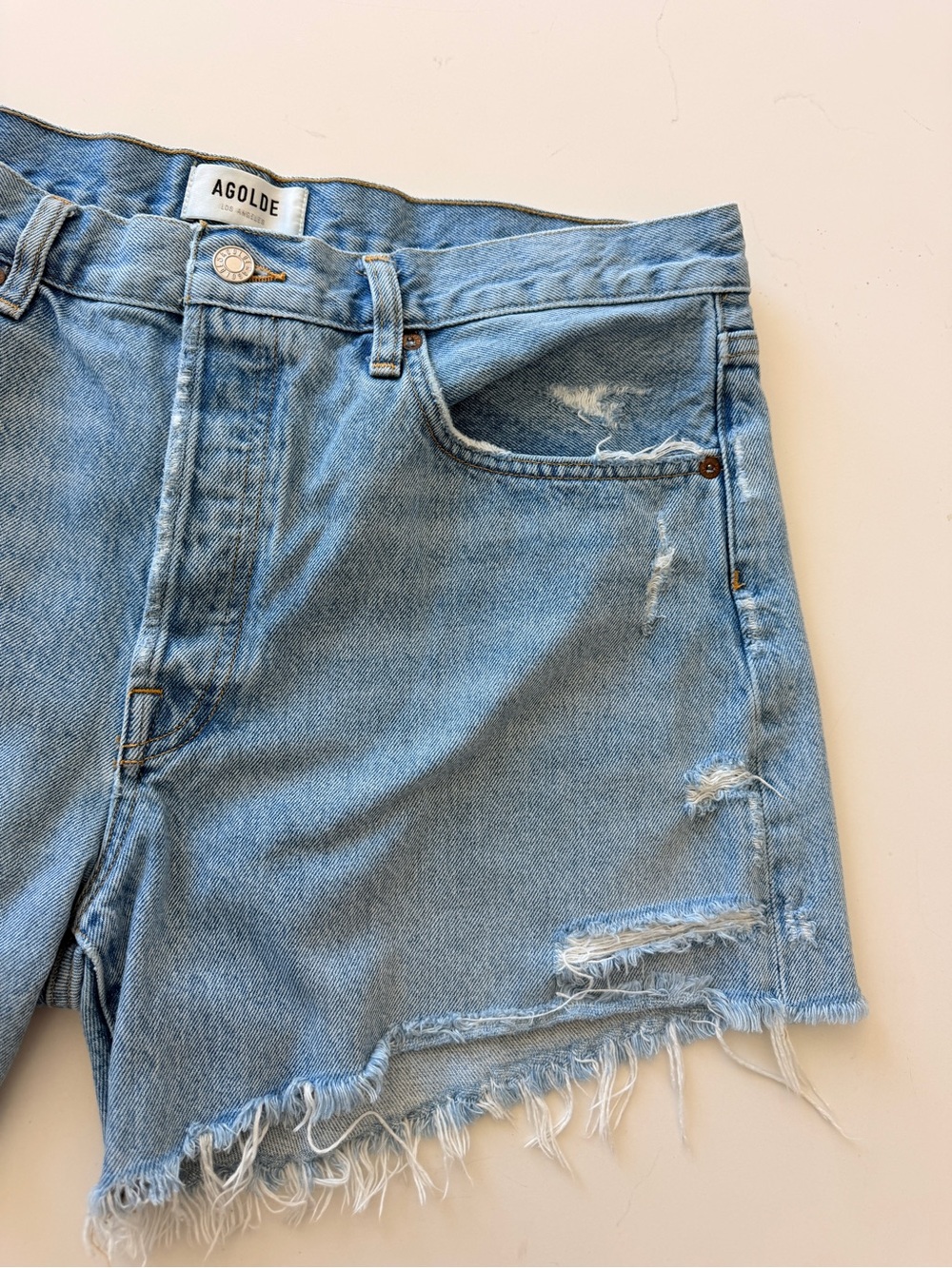 Agolde Light Wash Distressed Raw-Hem Denim Shorts